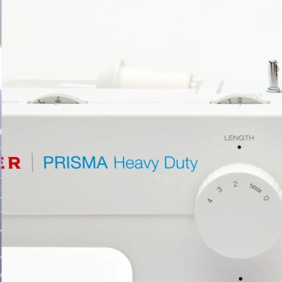 Maquina de coser singer prisma Heavy duty